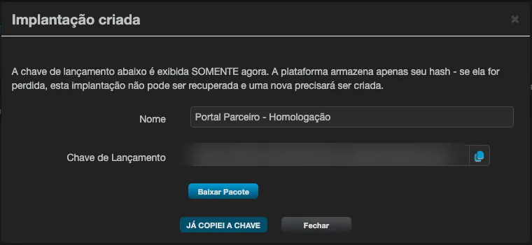 Janela Implantação criada, com o campo Chave de Lançamento (valor ocultado) e os botões Baixar Pacote e Já copiei a chave